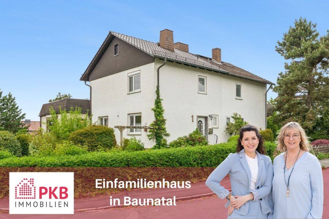 Immobilie in Baunatal - Doppelhaushälfte mit Garage und Gartenhaus - Bild 0