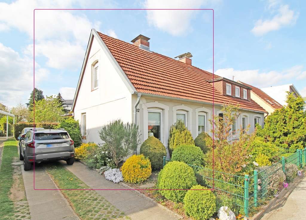 Immobilie in Bad Segeberg - Vermietete Doppelhaushälfte - zentrumsnah mit schönem Garten - Bild 1