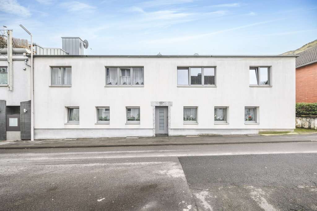 Immobilie in Alsdorf - Vermietetes 4-Parteienhaus mit Garten und Garage - Bild 2