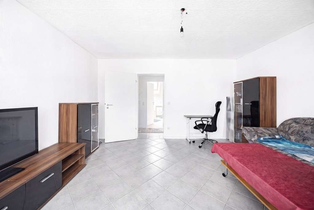 Immobilie in Buseck - *** Vermietete 3-Zimmer-Dachgeschosswohnung in Beuern mit aktuell 7% Bruttomietrendite *** - Bild 0