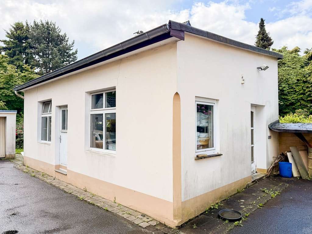 Immobilie in Bielefeld - Handwerker gesucht! Sanierungsobjekt mit Werkstatt und großem Grundstück in Bielefeld - Gellershagen - Bild 1