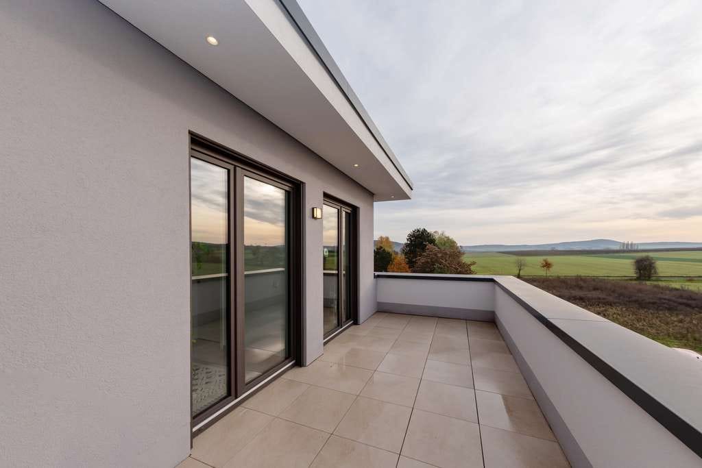 Immobilie in Braunweiler - Exklusive DHH mit hochwertiger Ausstattung und Dachterrasse mit Naturblick! - Bild 1