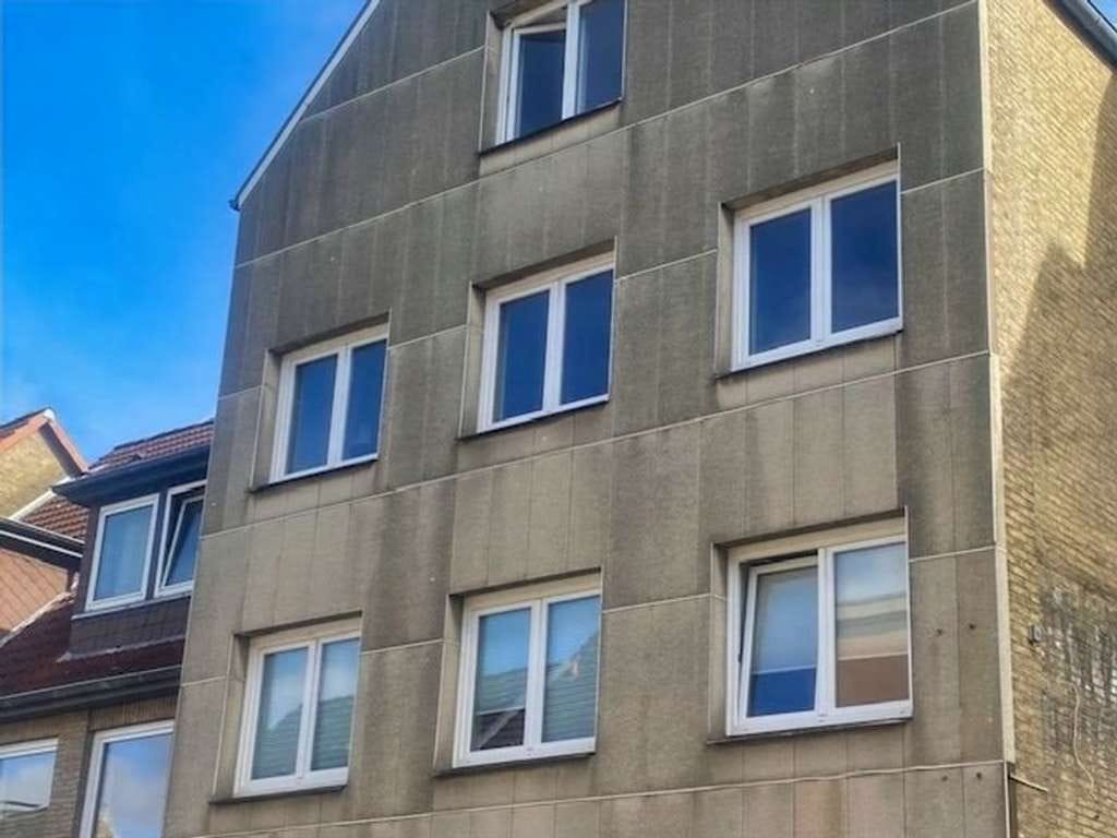 Immobilie in Schleswig - Gemütliche, solide und zentralgelegene 1,5 Zimmer Eigentumswohnung mit eigener Garage - Bild 1