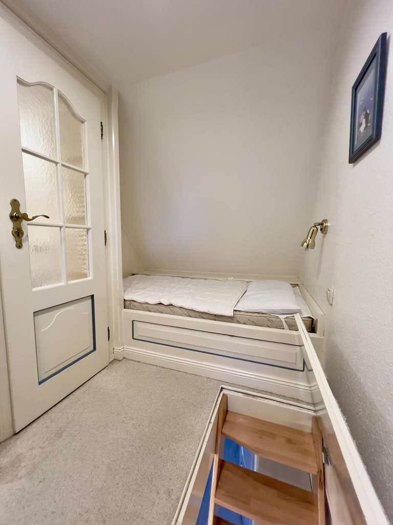 Immobilie in List auf Sylt - Dachgeschosswohnung unter Reet mit eigenem Gartenteil - Bild 3