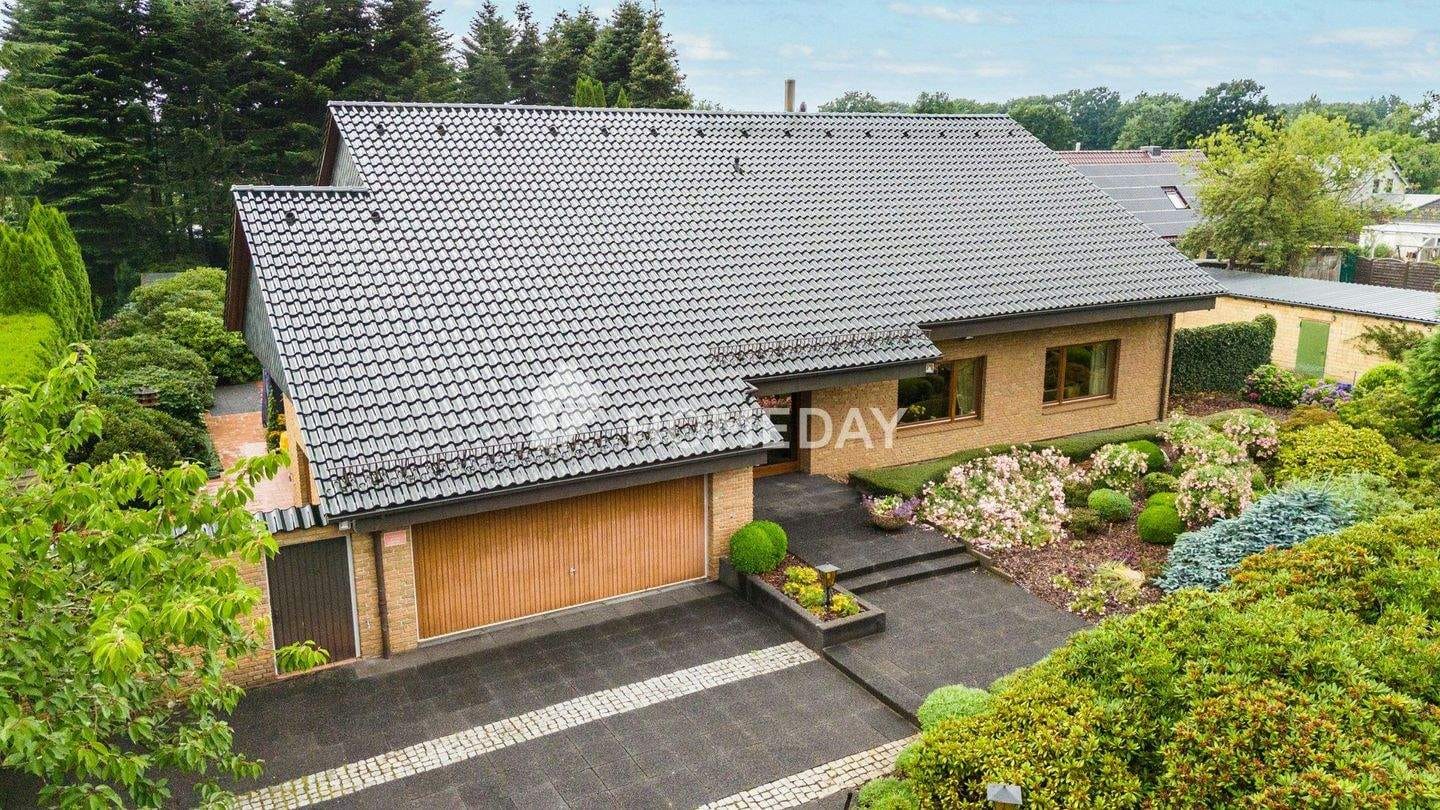 Immobilie in Kropp - Exklusives Haus mit 2 Einheiten, 377 m² Wohnfläche und Gartenparadies - ideal für Wohnen & Arbeiten - Bild 2