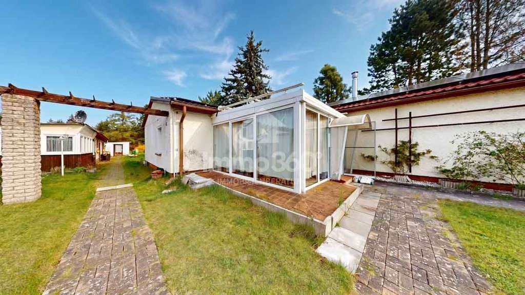 Immobilie in Nauen - Bezugsfreies Einfamilienhaus mit Wintergarten und großem Grundstück - Bild 1