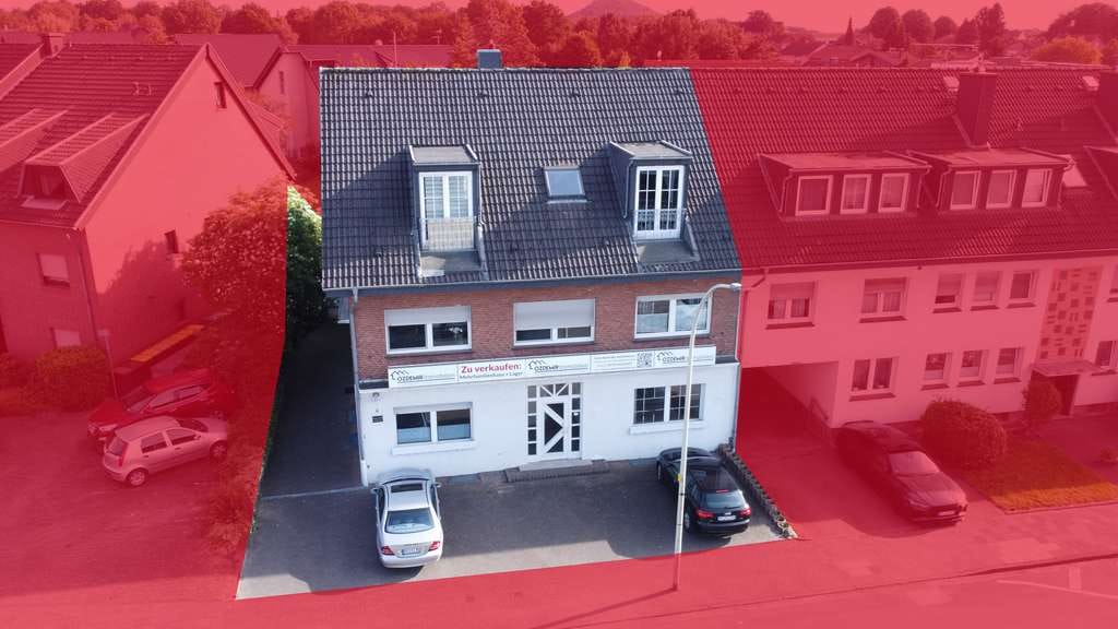 Immobilie in Übach-Palenberg - Mehrfamilienhaus mit 3 Wohnungen + Ladenlokal mit eigenen Grundbüchern - Bild 1