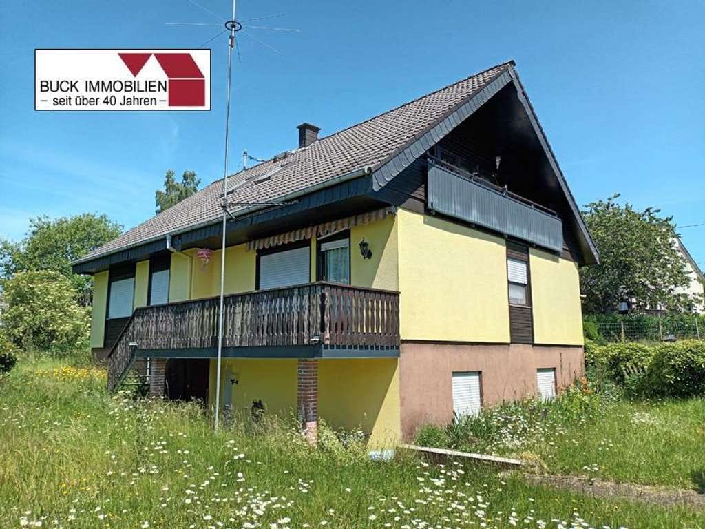 Immobilie in Hellenhahn-Schellenberg - Platz für die große Familie!  Gepflegtes Wohnhaus mit ELW in idyllischer Ortsrandlage - Bild 2