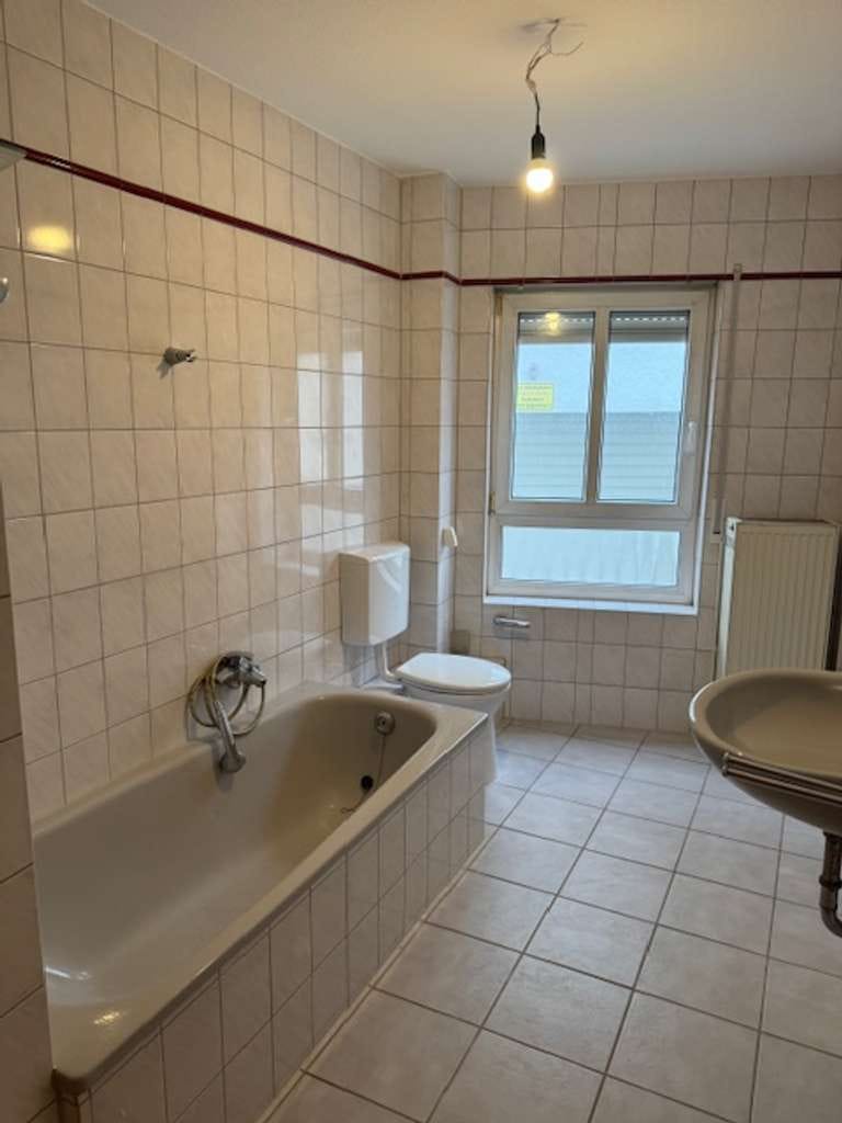 Immobilie in Hahnheim - Nutzen Sie Ihre Chance! Attraktives Mehrfamilienhaus als ideale Kapitalanlage in Hahnheim - Bild 3