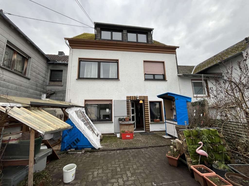 Immobilie in Hümmerich - Vermietetes Reihenmittelhaus mit kleinem Nebengebäude in Hümmerich! - Bild 1