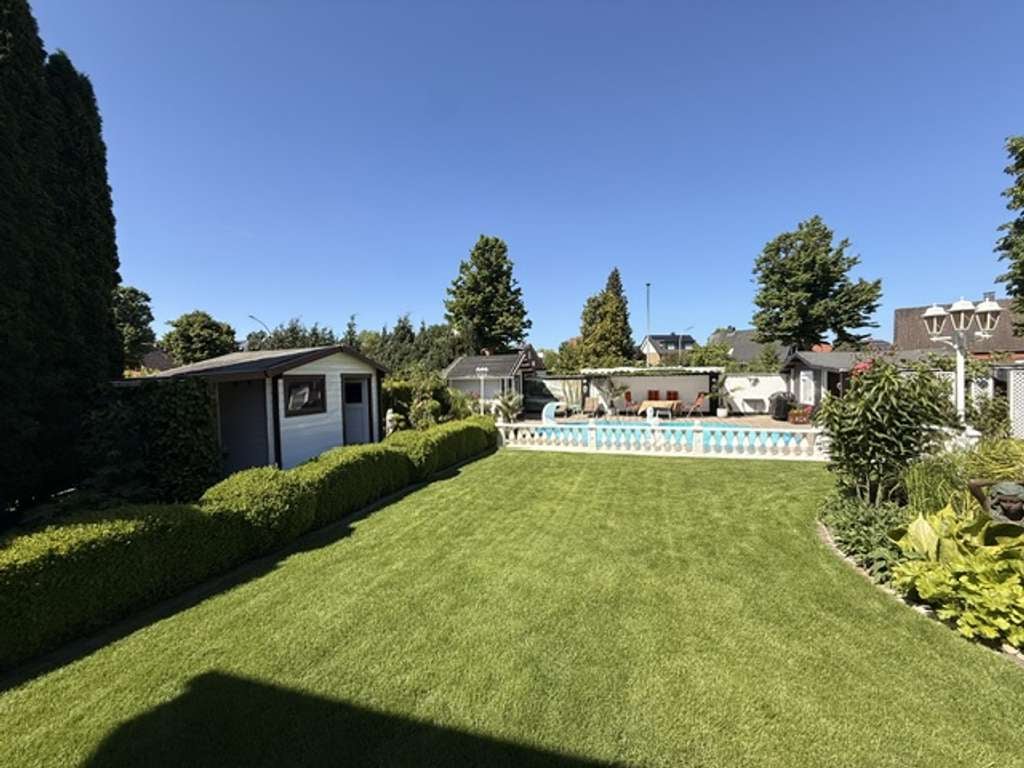 Immobilie in Harsewinkel - Schönes Einfamilienhaus - Platz für 2 Familien mit vielen Extras - Bild 2