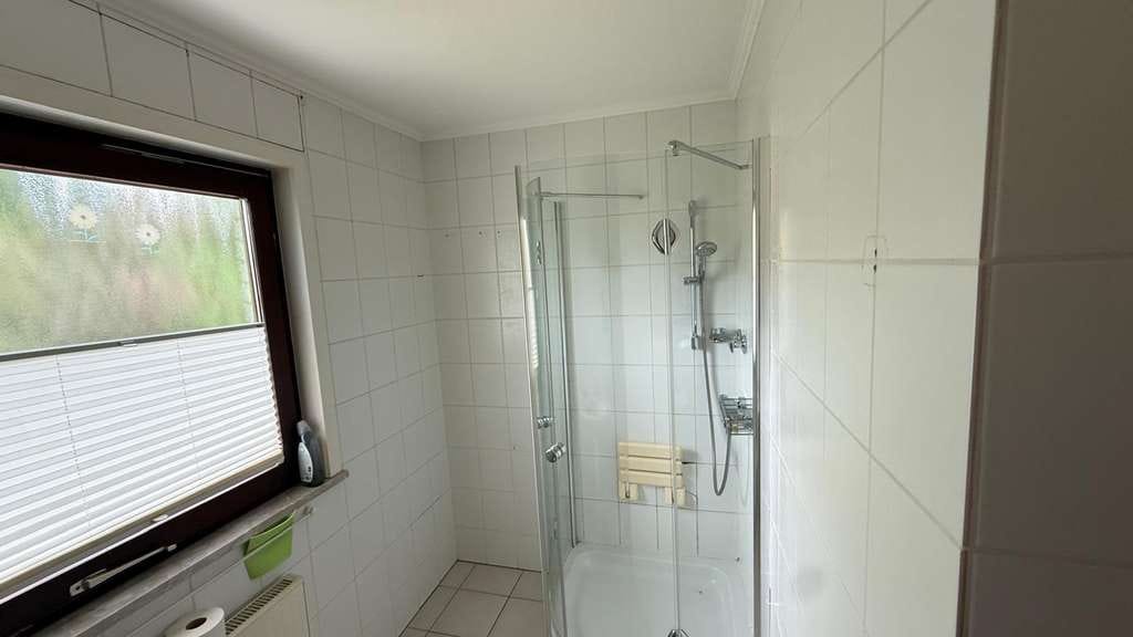 Immobilie in Pohlheim - Wohnung mit Haus-Charakter mit separatem Eingang, eigenem Garten und Garage mit direktem Zugang - Bild 2