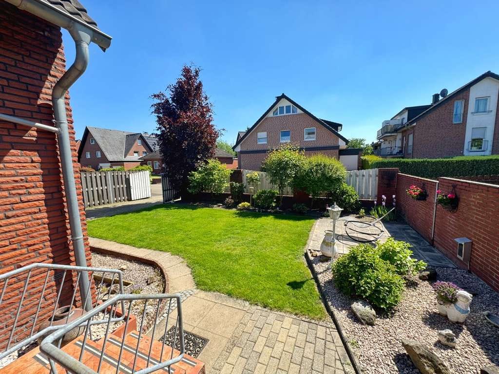 Immobilie in Emsdetten - Gepflegtes Zweifamilienhaus mit schönem Garten in Hollingen! - Bild 1