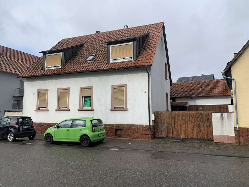 Immobilie in Herxheim - Sofort beziehbares Wohnhaus mit großer Garage und Garten! - Bild 0