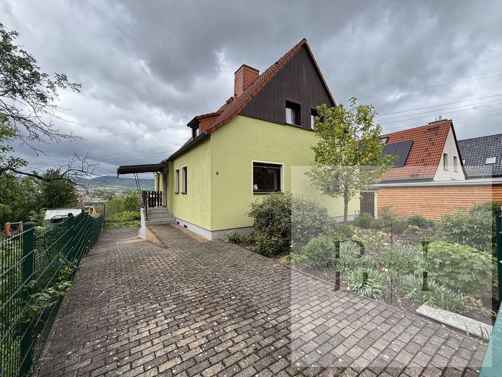 Immobilie in Saalfeld/Saale - Wohnen im Grünen – Freistehendes Einfamilienhaus mit großem Grundstück, Terrassen & Weitblick - Bild 0