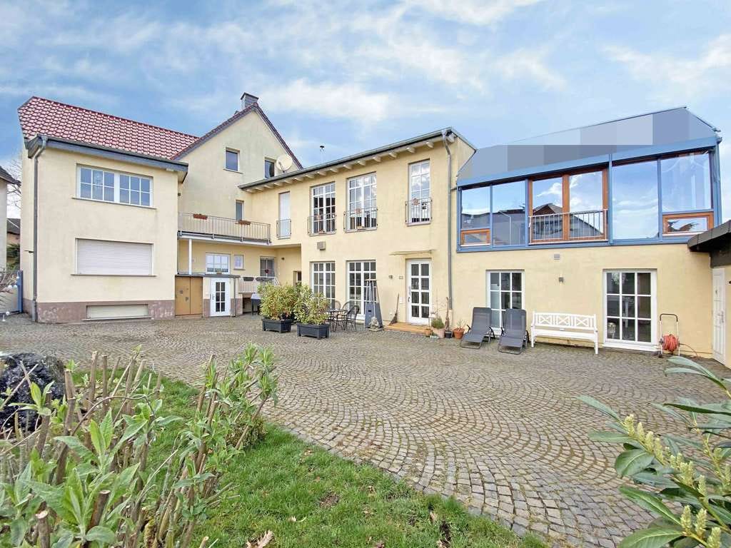 Immobilie in Pohlheim - Elegantes Zweifamilienhaus mit großzügigem Wohnkonzept - Bild 0