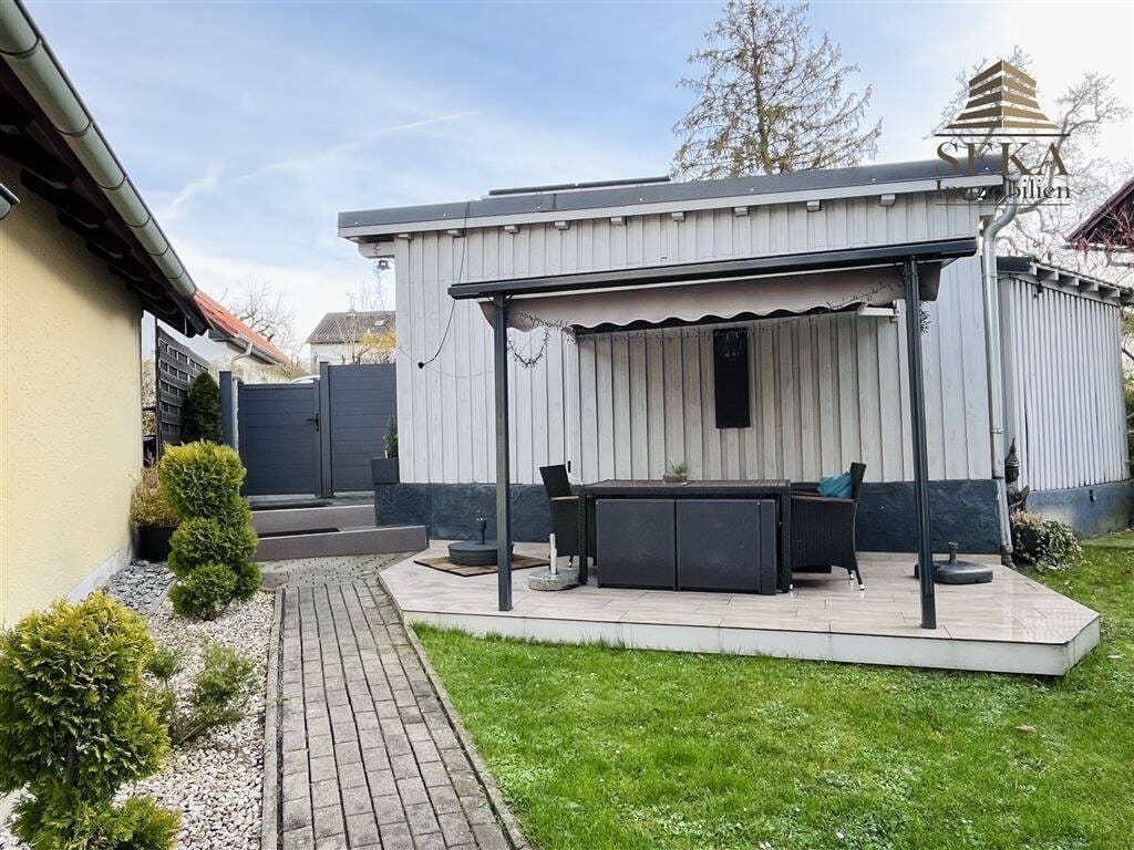 Immobilie in Schöllnach - Familienhaus in gewachsener Lage - komfortabel mit Carport - Bild 3