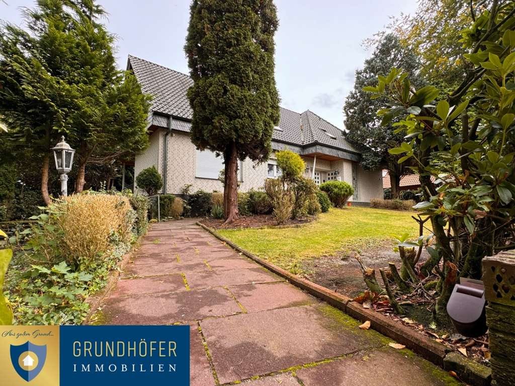 Immobilie in Bösel - Zweifamilienhaus mit parkähnlichem Grundstück in traumhafter Lage in Bösel - Bild 0