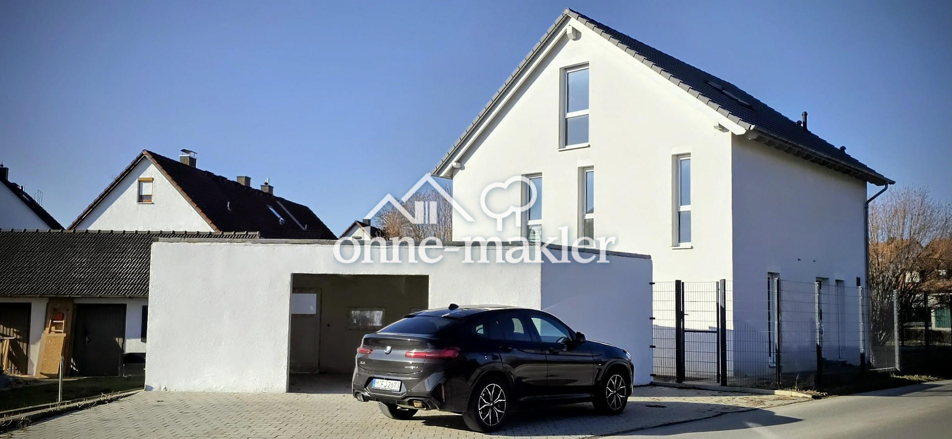 Immobilie in Röhrmoos - Luxus Einfamilienhaus mit Einliegerwohnung, Garage, Terrasse und großem Grundstück - Bild 0