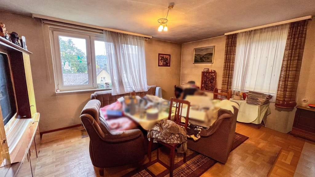 Immobilie in Weißbach - Großzügiges Einfamilienhaus mit Entwicklungspotenzial - Bild 1