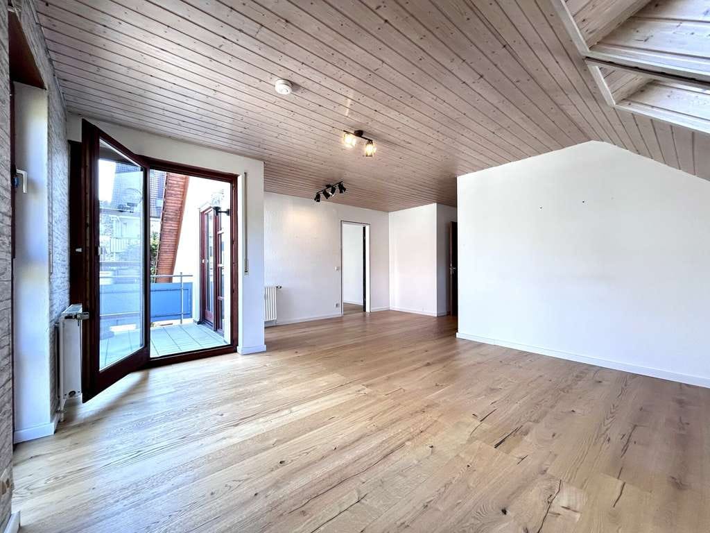 Immobilie in Altbach - Gepflegte Dachgeschosswohnung mit Balkon, TG-Stellplatz und zusätzlich ausgebautem Spitzboden - Bild 0