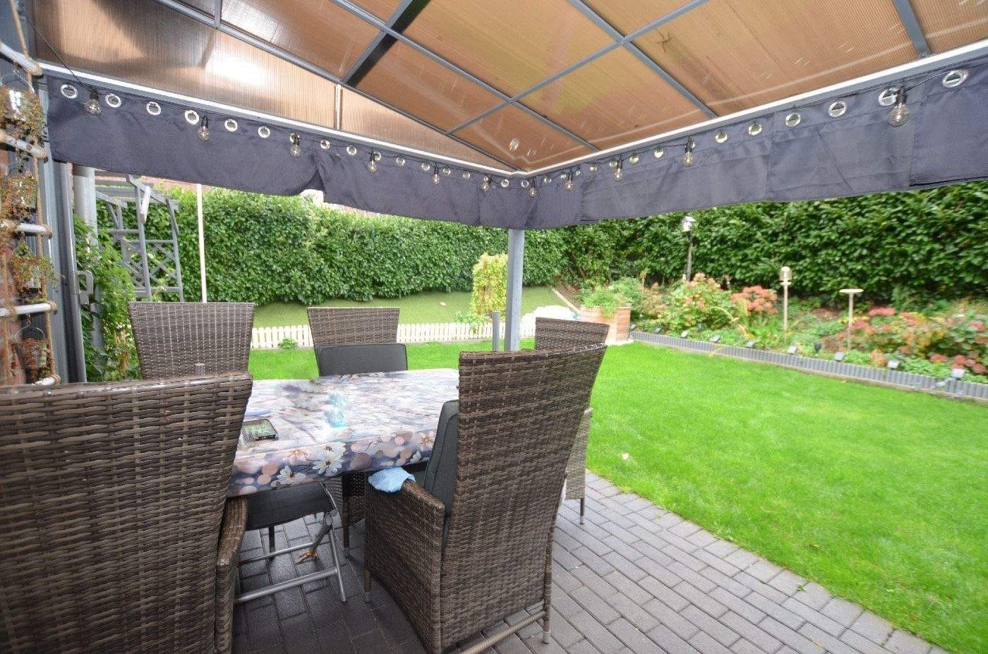 Immobilie in Bedburg-Hau - Kapitalanlage mit Zukunft - Voll vermietetes modernes und gepflegtes 3-Parteienhaus im Reihenhausstil in Bedburg-Hau - Bild 3