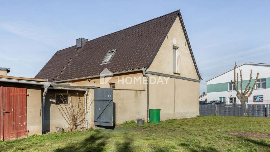 Immobilie in Zörbig - Solide gebaut, modernisiert & vielseitig nutzbar: EFH mit Garage, Nebengebäude und großem Grundstück - Bild 1