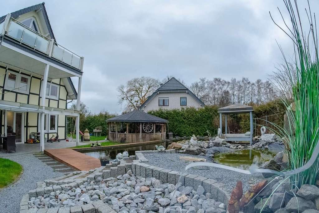 Immobilie in Lemgo - Grünes Paradies-Mehrfamilienhaus mit traumhafter Gartenlandschaft - Bild 4