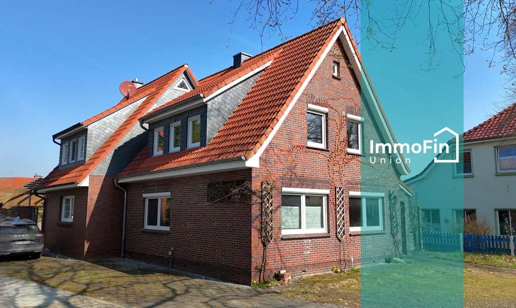 Immobilie in Zetel - Vorne gut erreichbar, hinten grüner Rückzugsort – Haus mit Gewerbe & großem Grundstück - Bild 0