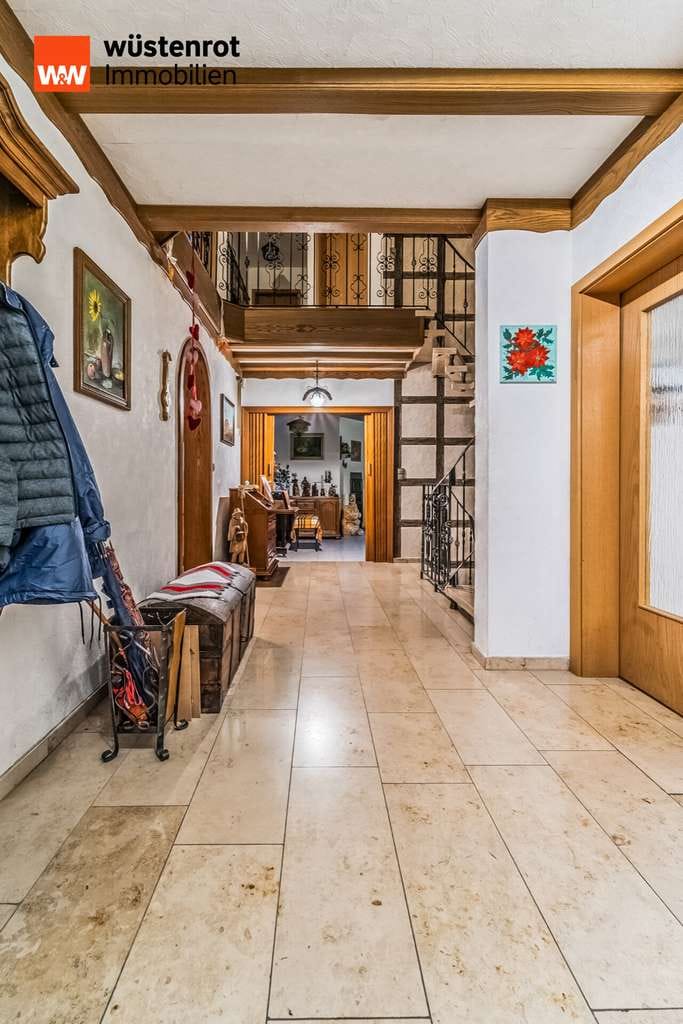 Immobilie in Bösel - Geräumiges Wohnhaus mit Doppelgarage und vielfältigen Nutzungsmöglichkeiten in begehrter Wohnlage - Bild 2