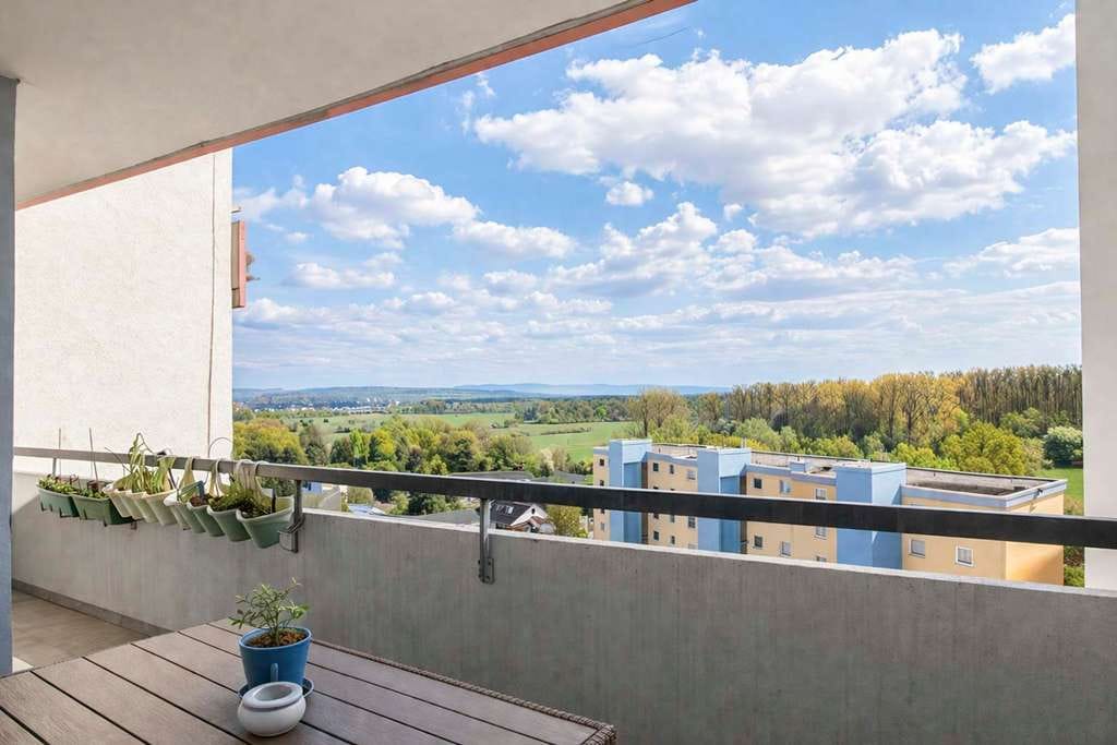 Immobilie in Erlensee - Viel Platz für Familienleben – 4-Zimmer-Wohnung mit großer Loggia - Bild 1