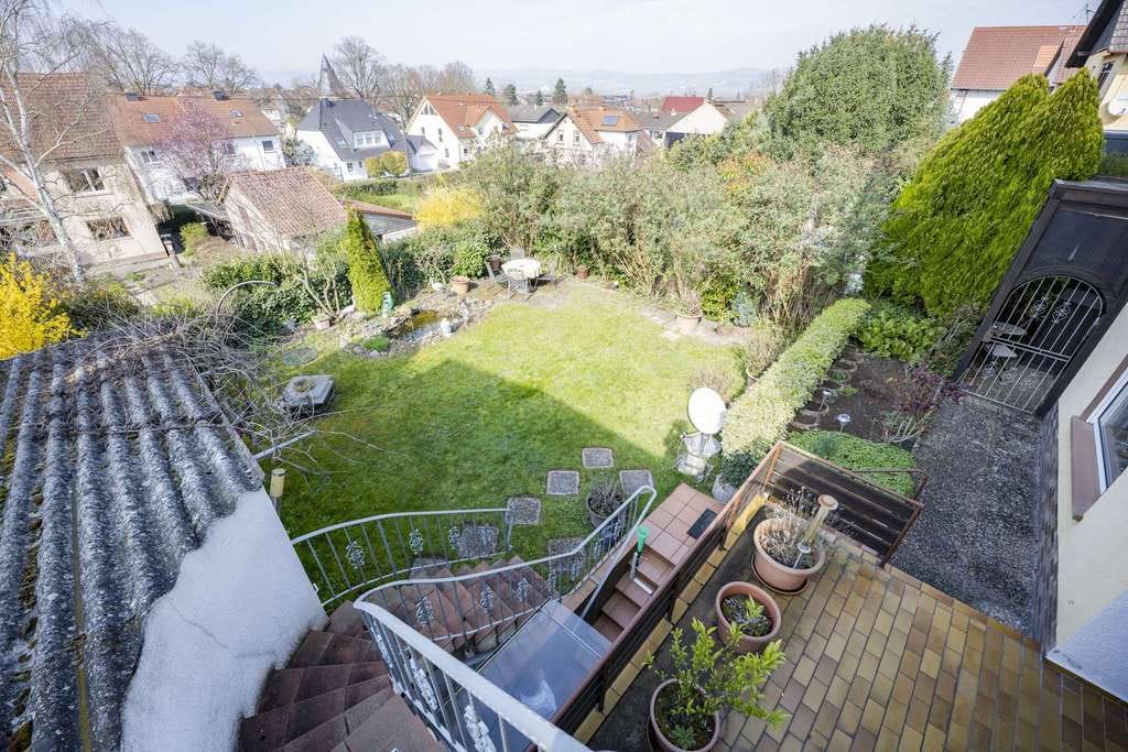 Immobilie in Gau-Algesheim - Nettes Einfamilienhaus mit Potenzial zum Mehrgenerationenwohnen: Ruhige Lage, traumhafter Garten! - Bild 1