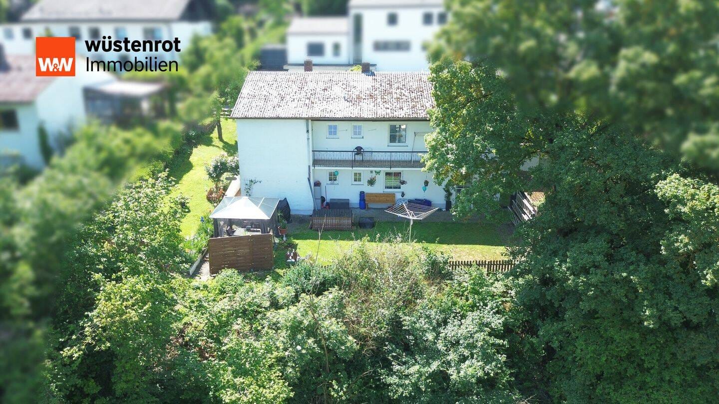 Immobilie in Nittendorf - Zweifamilienhaus mit vermieteter Einliegerwohnung und bezugsfreiem Obergeschoss - Bild 2