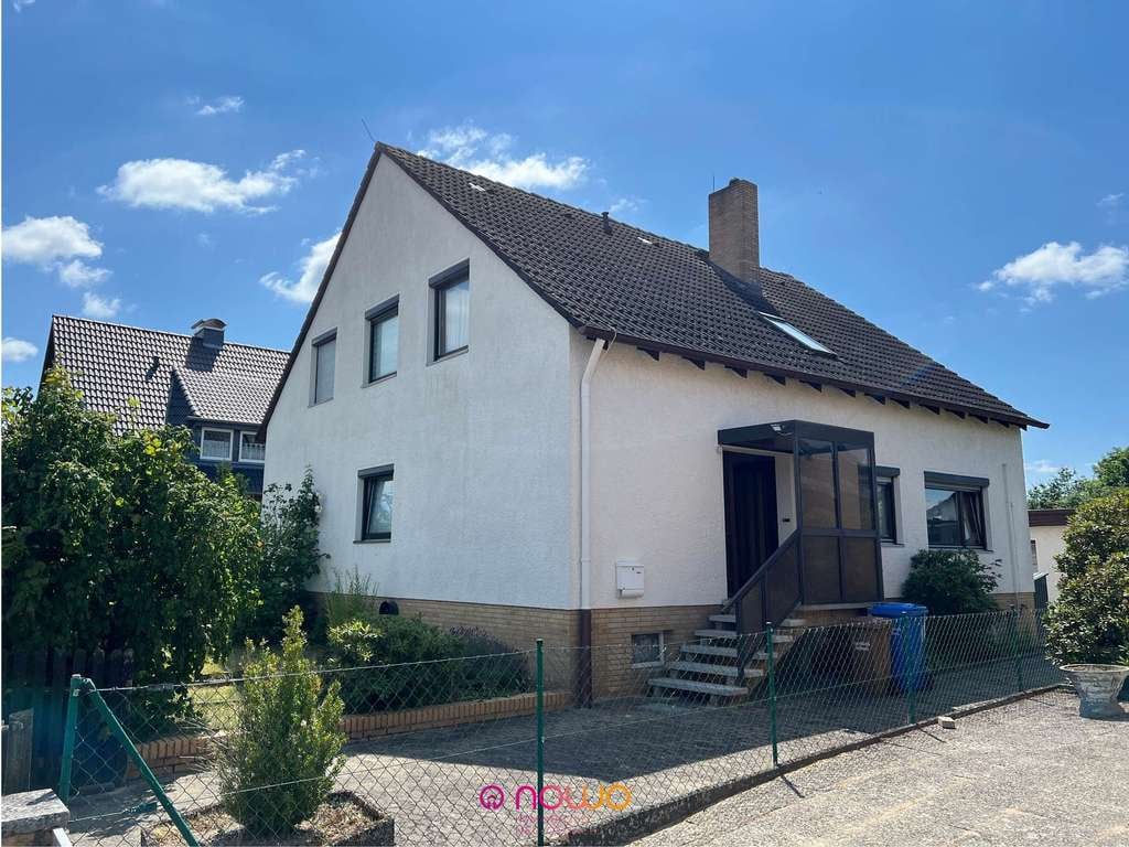 Immobilie in Weyhausen - Einfamilienhaus: auch für zwei Generationen - mit Nebengebäude, Garage und Keller! - Bild 0