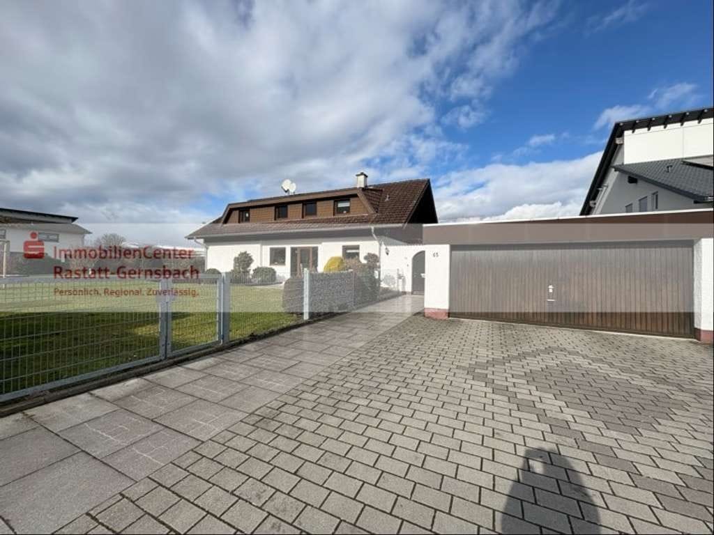 Immobilie in Muggensturm - Familienleben im lichtdurchfluteten Einfamilienhaus mit großem Garten in Muggensturm   - Bild 1