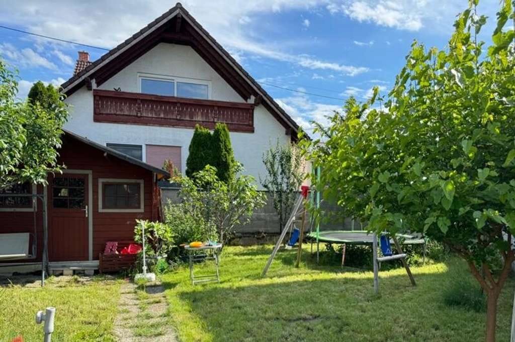 Immobilie in Guntersblum - ** Wohnen mit Perspektive – Einfamilienhaus inklusive Baugrundstück ** - Bild 0
