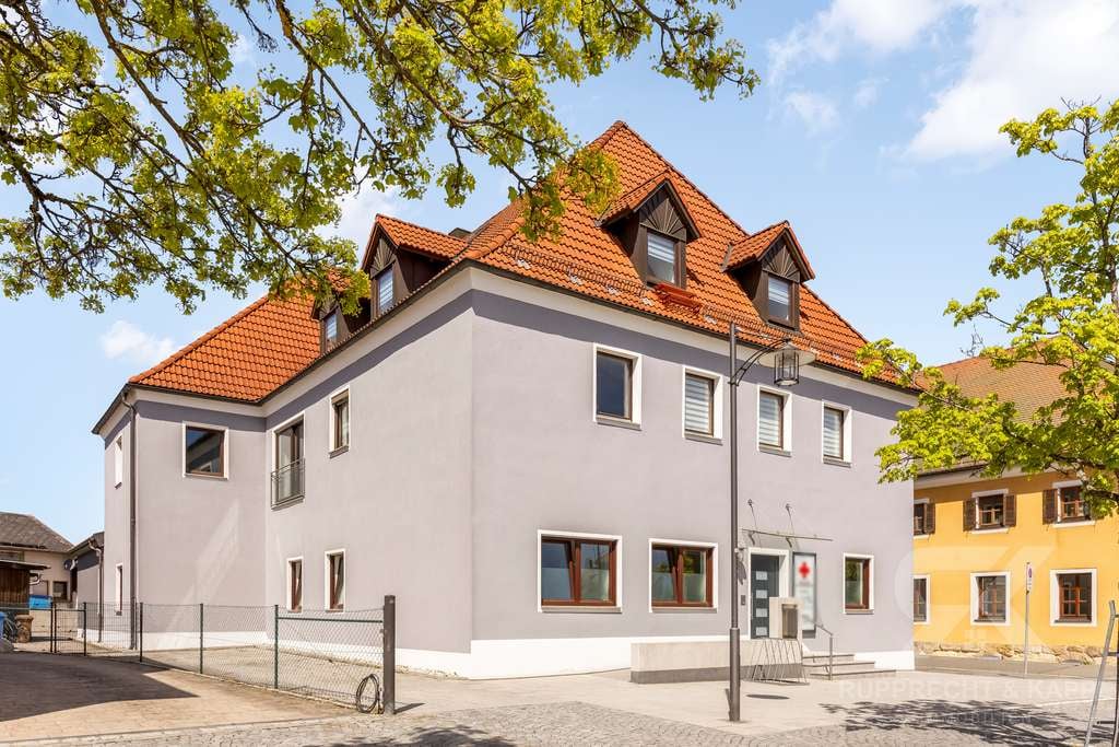 Immobilie in Grafenwöhr - Lange und Sichere Mieteinnahmen: Kapitalanlage mit Arztpraxis als starkem Ankermieter in Grafenwöhr - Bild 1