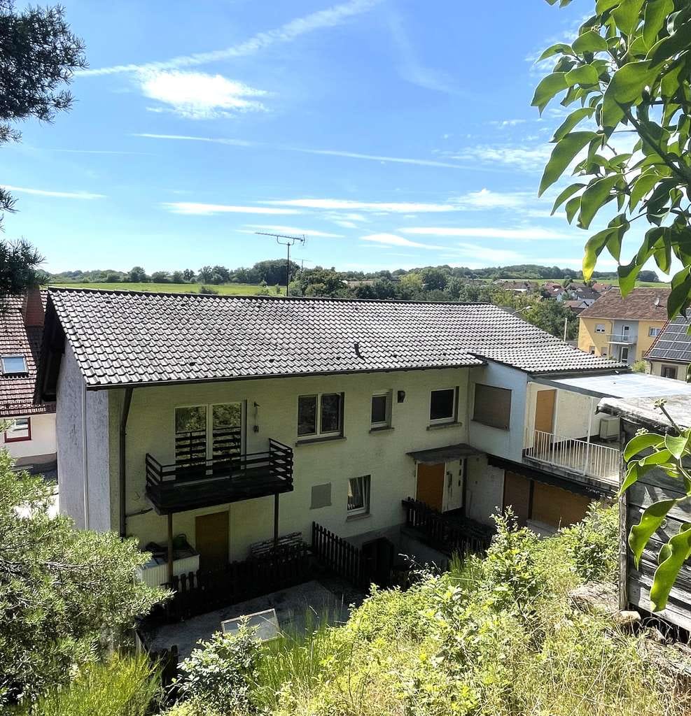 Immobilie in Kottweiler-Schwanden - Großzügiges Wohnhaus mit vielseitigen Nutzungsmöglichkeiten und Baureserve - Bild 1