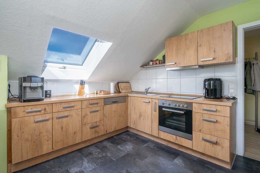 Immobilie in Zimmern ob Rottweil - Dachgeschosswohnung mit Loggia und Garage in Zimmern ob Rottweil - Bild 2