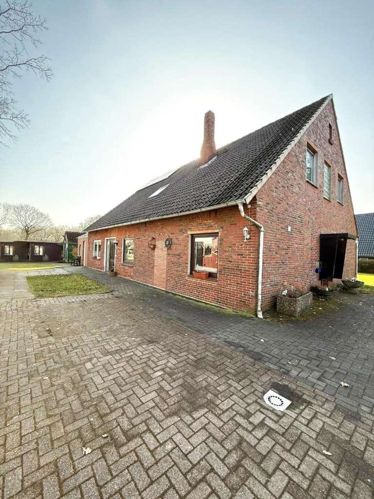 Immobilie in Loxstedt - Zweifamilienhaus mit PV-Anlage & großem Südgrundstück - Bild 0