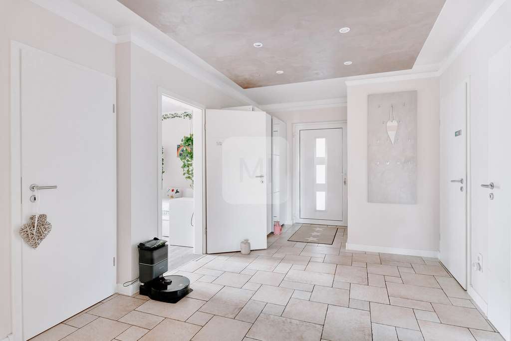 Immobilie in Schneverdingen - Ein Zuhause mit Möglichkeiten – Modernisiertes Haus mit Pool und Einliegerwohnung - Bild 2
