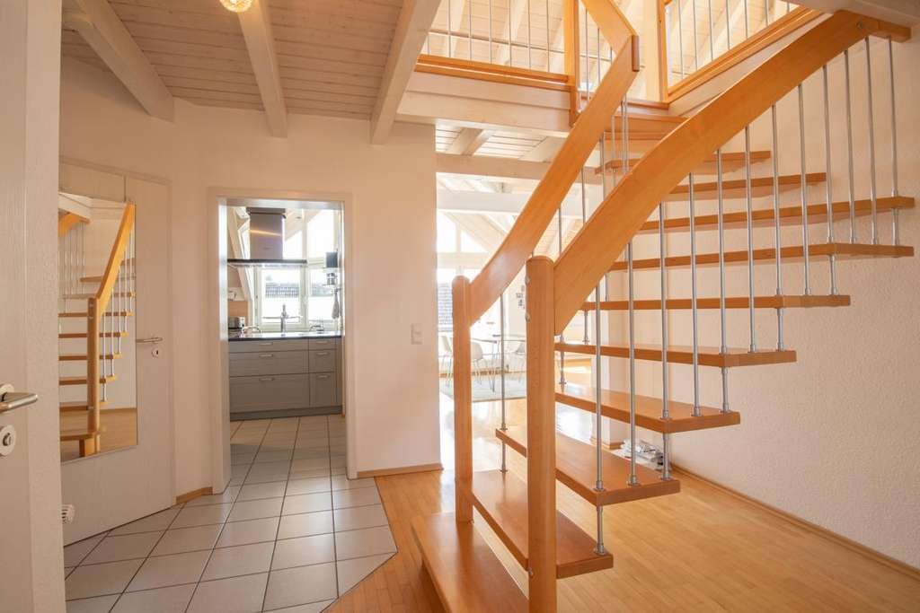 Immobilie in Heuweiler - Stilvolle Maisonette-Wohnung mit Galerie und offenem Wohnkonzept - Bild 1