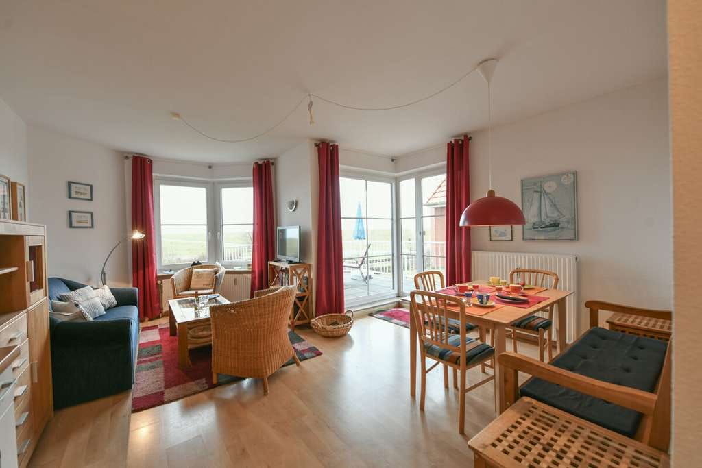 Immobilie in Wangerooge - Sonnige Ferienimmobilie mit Südbalkon und Deichblick - Bild 0