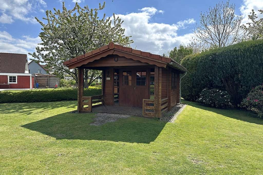 Immobilie in Niebüll - Ebenerdiges Holzhaus in Bungalowbauweise mit Doppelcarport und großem Süd-West-Garten 
in Niebüll - Bild 4