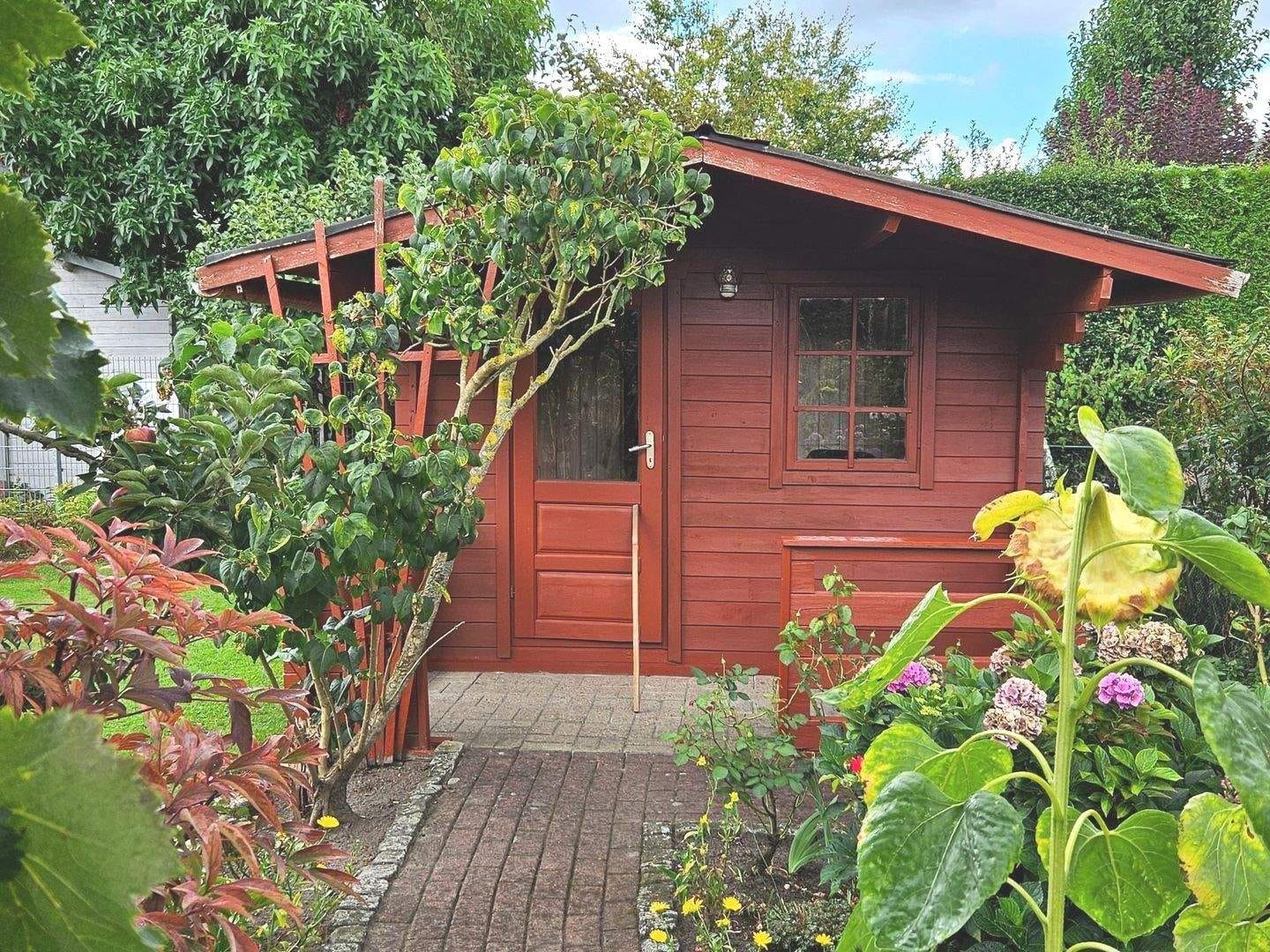 Immobilie in Löningen - Auf der Lage! Erdgeschoss! Gepflegte Wohnung mit überdachter Terrasse und schönem Garten mit Gartenhütte! 4 ZKB mit EBK, HWR und PKW-Stellplatz! - Bild 4