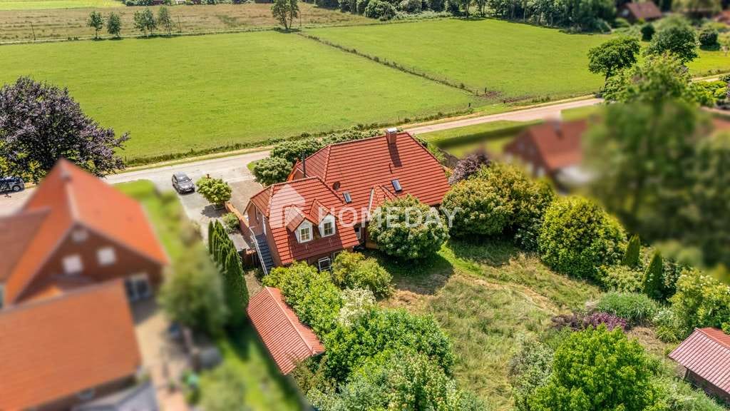 Immobilie in Rechtsupweg - Großzügiges Wohnen mit Einliegerwohnung und traumhaftem Garten in ruhiger Lage - Bild 1