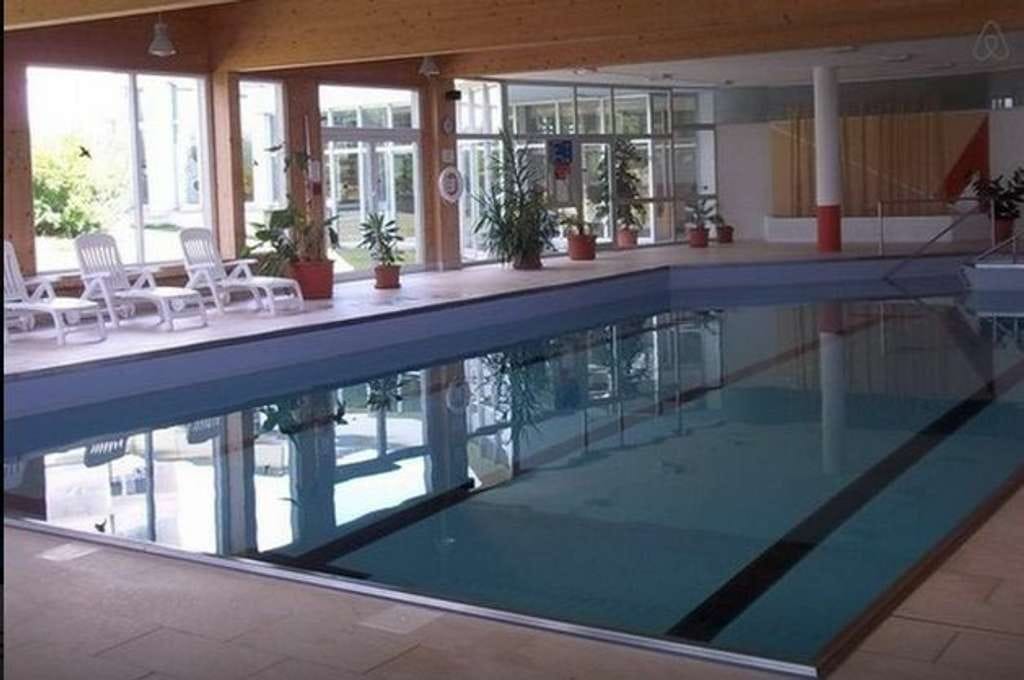 Immobilie in Neureichenau - Modernisierte 2-Zimmer-Wohnung mit Balkon, Hallenbad und Sauna im Bayerischen Wald - Bild 1