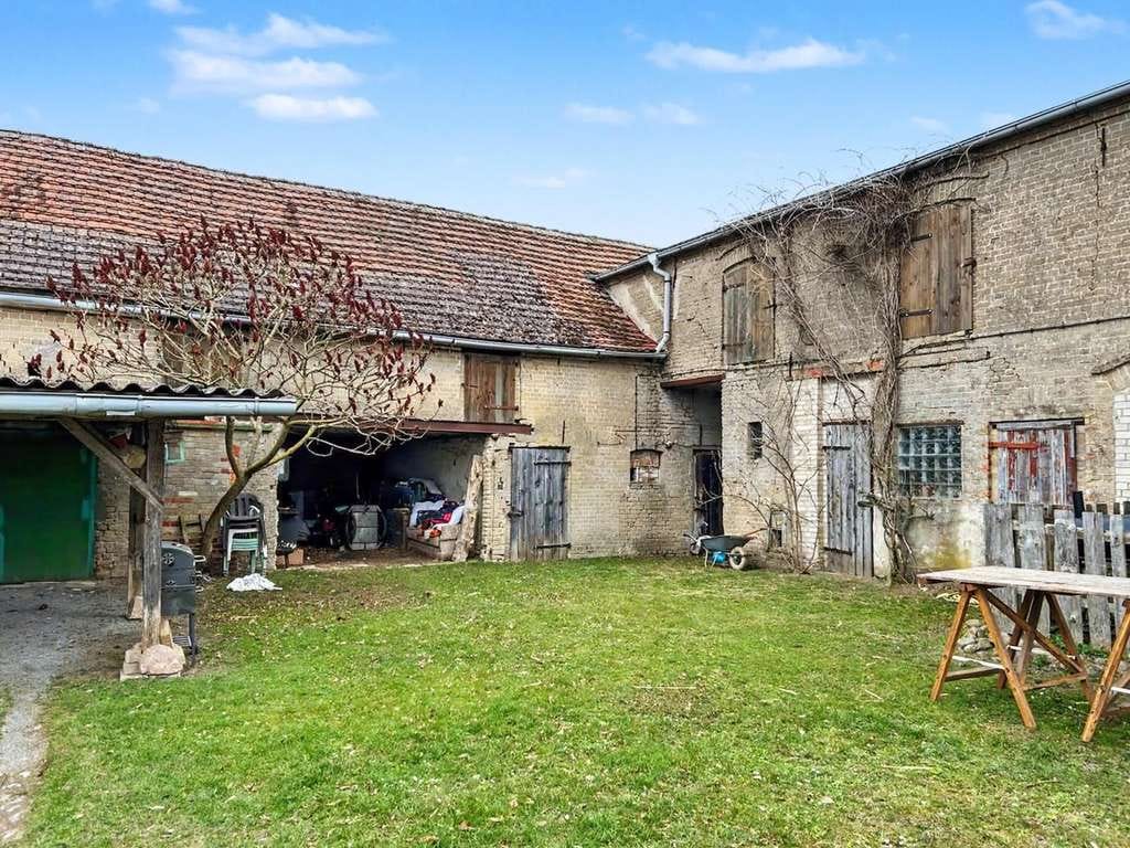 Immobilie in Stüdenitz-Schönermark - 3-Seitenhof mit drei vermieteten Wohneinheiten mit viel Land in Stüdenitz-Schönermark - Bild 1