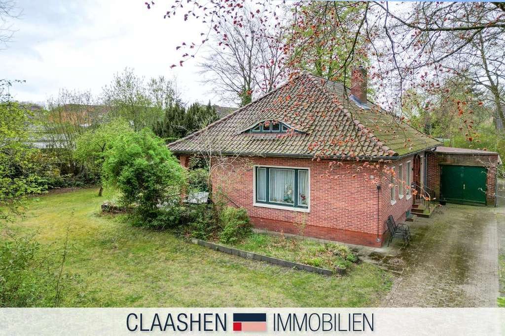 Immobilie in Hage - Charmantes Zuhause mit Kamin und Platz für Ihre Wohnideen - Bild 0