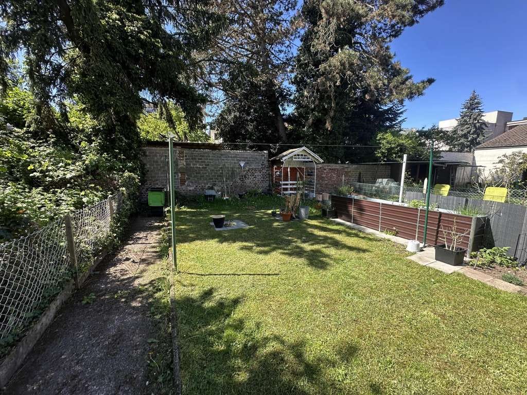 Immobilie in Dillingen/Saar - Charmantes Zweifamilienhaus mit Garten und großzügigen Wohnbereichen - Bild 2